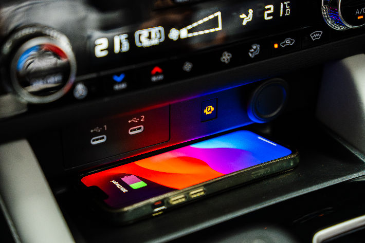 The 2026 Outlander PHEV has an available Wireless Phone Charger