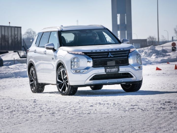 Andy Lilienthal driving the Outlander PHEV on the ice track